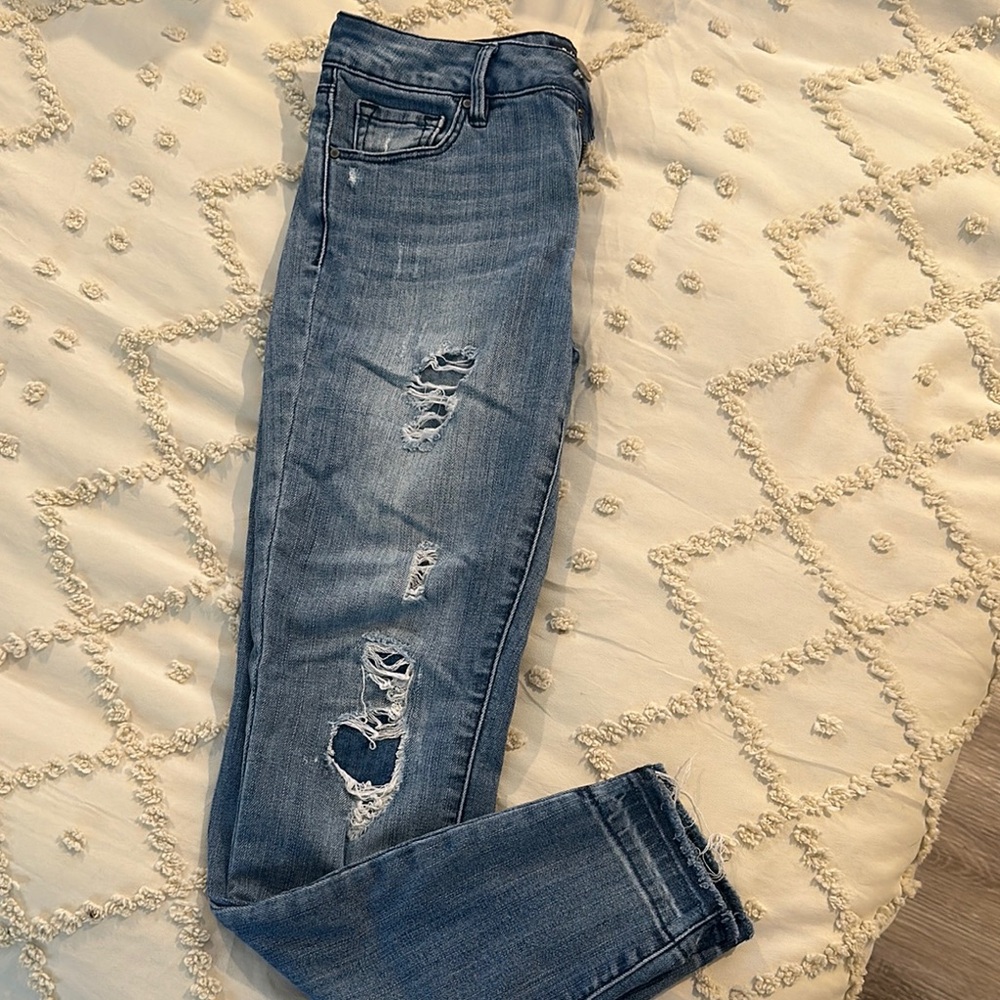 Women's Distressed Blue Jeans